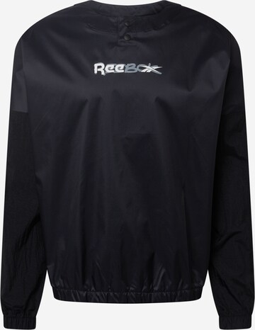 Reebok - Chaqueta de chándal en negro: frente