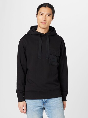 Sweat-shirt Calvin Klein Jeans en noir : devant