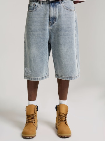 Loosefit Jeans di Ed Hardy in blu: frontale