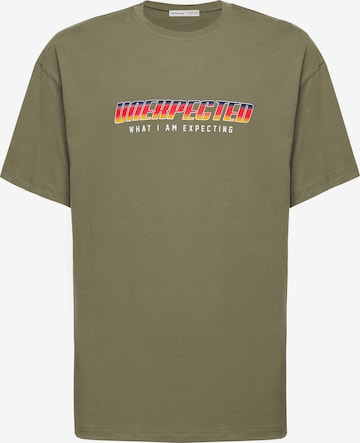 Grimelange T-Shirt 'UNEXPECTED' in Grün: predná strana