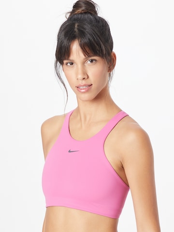 Bustier Soutien-gorge de sport 'ALATE' NIKE en rose : devant