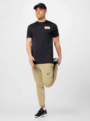 NIKE Performance shirt 'Body shop' in Black