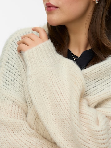 Vero Moda Curve Вязаная кофта 'VMCMaybe' в Бежевый