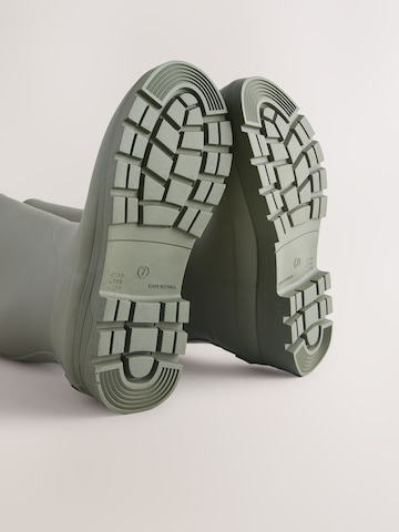 Next Kumisaappaat värissä vihreä