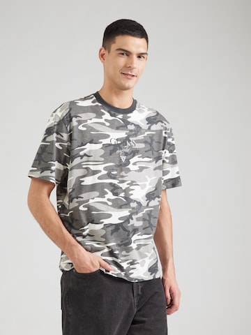 T-Shirt GUESS Originals en gris : devant
