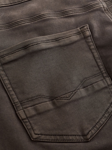 Slimfit Jeans di Next in marrone