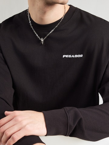 T-Shirt 'RUSK' Pegador en noir