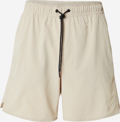 Sportinės kelnės 'UNLIMITED' iš NIKE, spalva – rusvai žalia, Prekių apžvalga