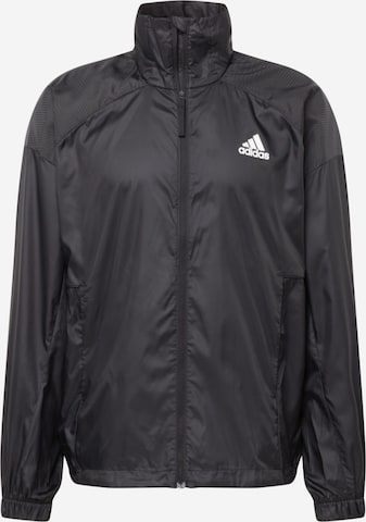 ADIDAS SPORTSWEAR - Casaco deportivo 'TRAVEER' em preto: frente