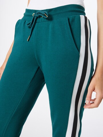 Urban Classics Tapered Pants in Green