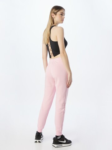 Nike Sportswear Slimfit Housut värissä vaaleanpunainen