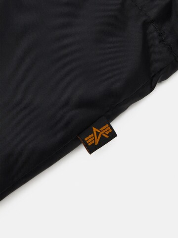 ALPHA INDUSTRIES Ostoskassi 'Wolfhounds' värissä musta