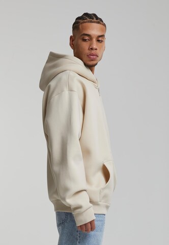 Veste de survêtement 'Essential' Karl Kani en beige
