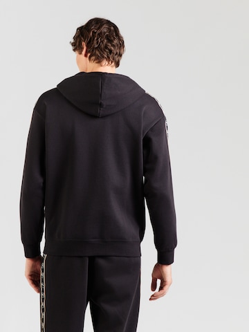 PUMA - Sudadera con cremallera 'Ess' en negro