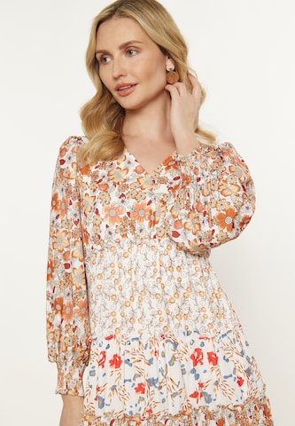 Usha Jurk in Oranje