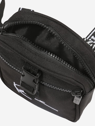 Karl Kani Crossbody Bag in Black