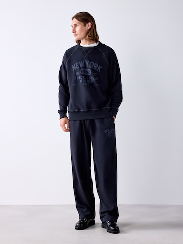 Loosefit Pantaloni di Next in nero