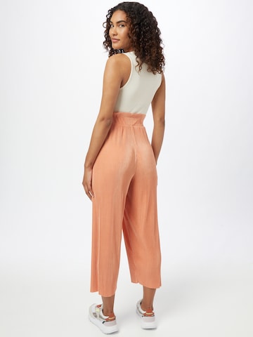 ABOUT YOU Limited Loose fit Pants 'Libby' in Orange