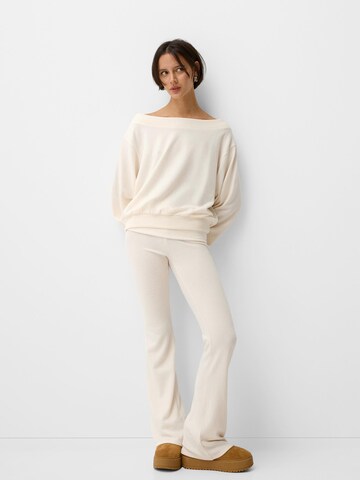 Bershka Flared Nadrág - bézs