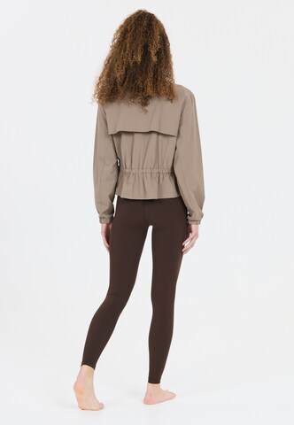 Athlecia Skinny Sports trousers 'Luxe' in Brown