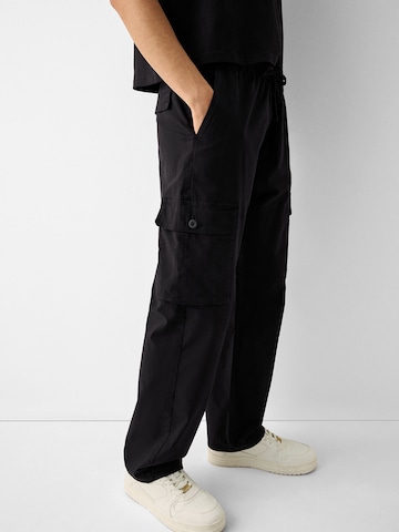 Loosefit Pantaloni cu buzunare de la Bershka pe negru