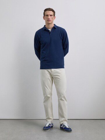 Scalpers T-shirt i blå: framsida