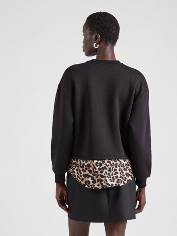Sweat-shirt 'Presley' ABOUT YOU en noir