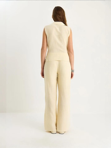 Completo pantalone di Bianco Lucci in giallo