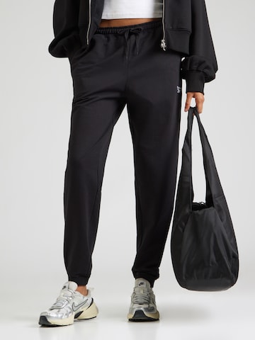 Effilé Pantalon Reebok en noir : devant