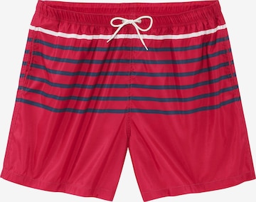 JOHN DEVIN Board Shorts in Red: front