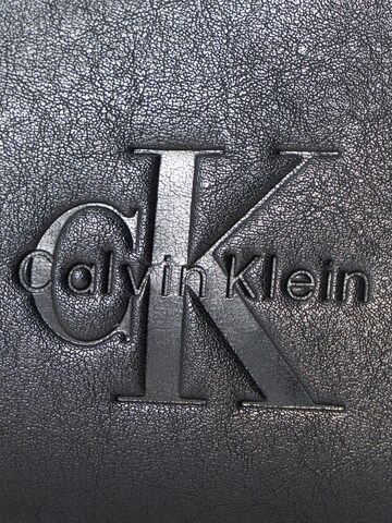 Calvin Klein Чанта за през рамо тип преметка в черно