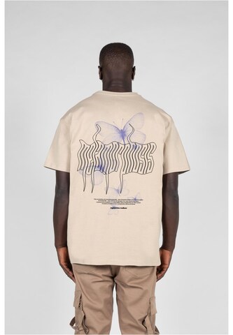 MJ Gonzales - Camiseta 'METAMORPHOSE V.4 x Heavy' en beige