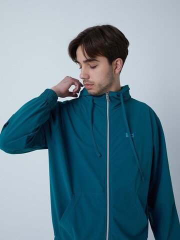 SPORTKIND Trainingsjacke 'Trainingsjacke'‌‌‌‌‌‌‌‌‌ in Grün