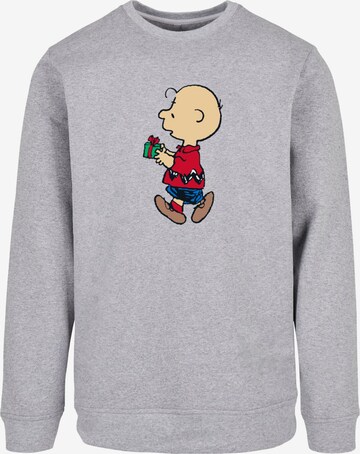 Merchcode Sweatshirt 'Peanuts Charlie´s Small Surprise' in Grijs: voorkant