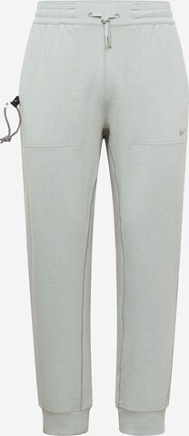 Pantalon de sport NIKE en vert : devant