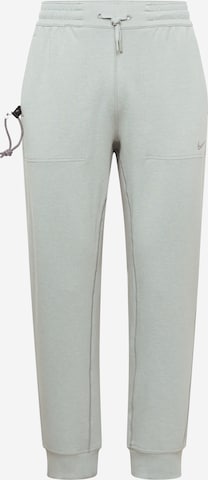 Effilé Pantalon de sport NIKE en vert : devant