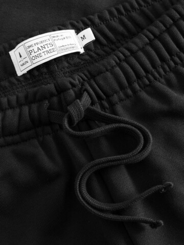 NIKIN Tapered Trousers 'Tree' in Black