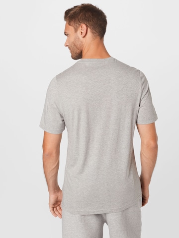 T-Shirt fonctionnel Reebok en gris