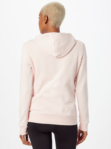 PUMA Bluzka sportowa 'Essentials' w kolorze różowy