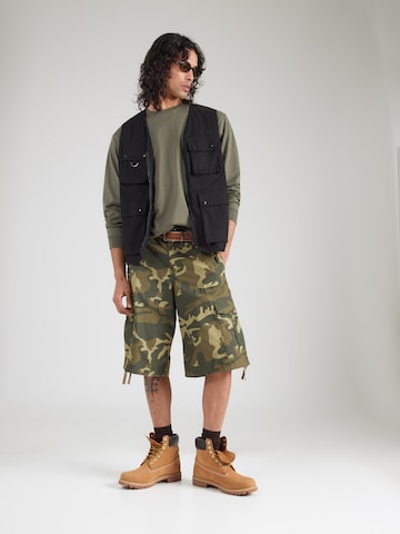 Carhartt WIP T-shirt 'Chase' i grön