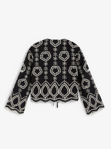 Scalpers Blus ' ' i svart