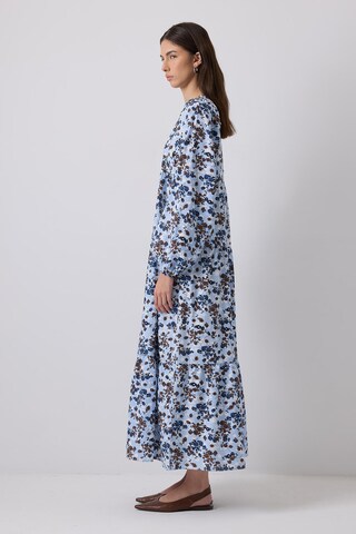 Touche Prive Jurk in Blauw: voorkant