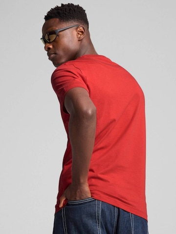 T-Shirt 'Puma Ess Logo Lab Tee' PUMA en rouge