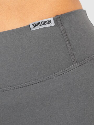 Skinny Pantalon de sport 'Advance Pro' Smilodox en gris