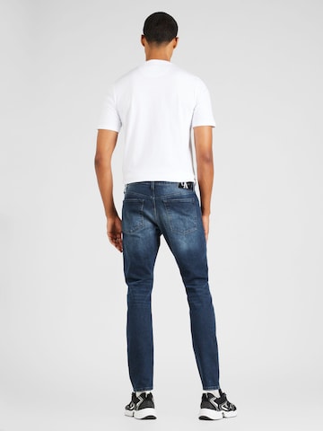 Calvin Klein Jeans Tapered Jeans in Blau