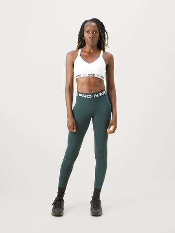zaļš NIKE Šaurs Sporta bikses 'Pro'