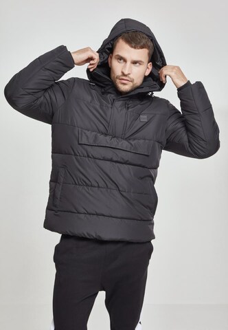 Urban Classics Winter Jacket in Black: front