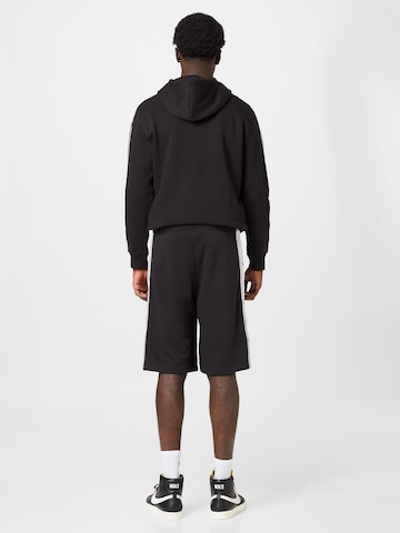 Champion Authentic Athletic Apparel Loosefit Shorts in Schwarz