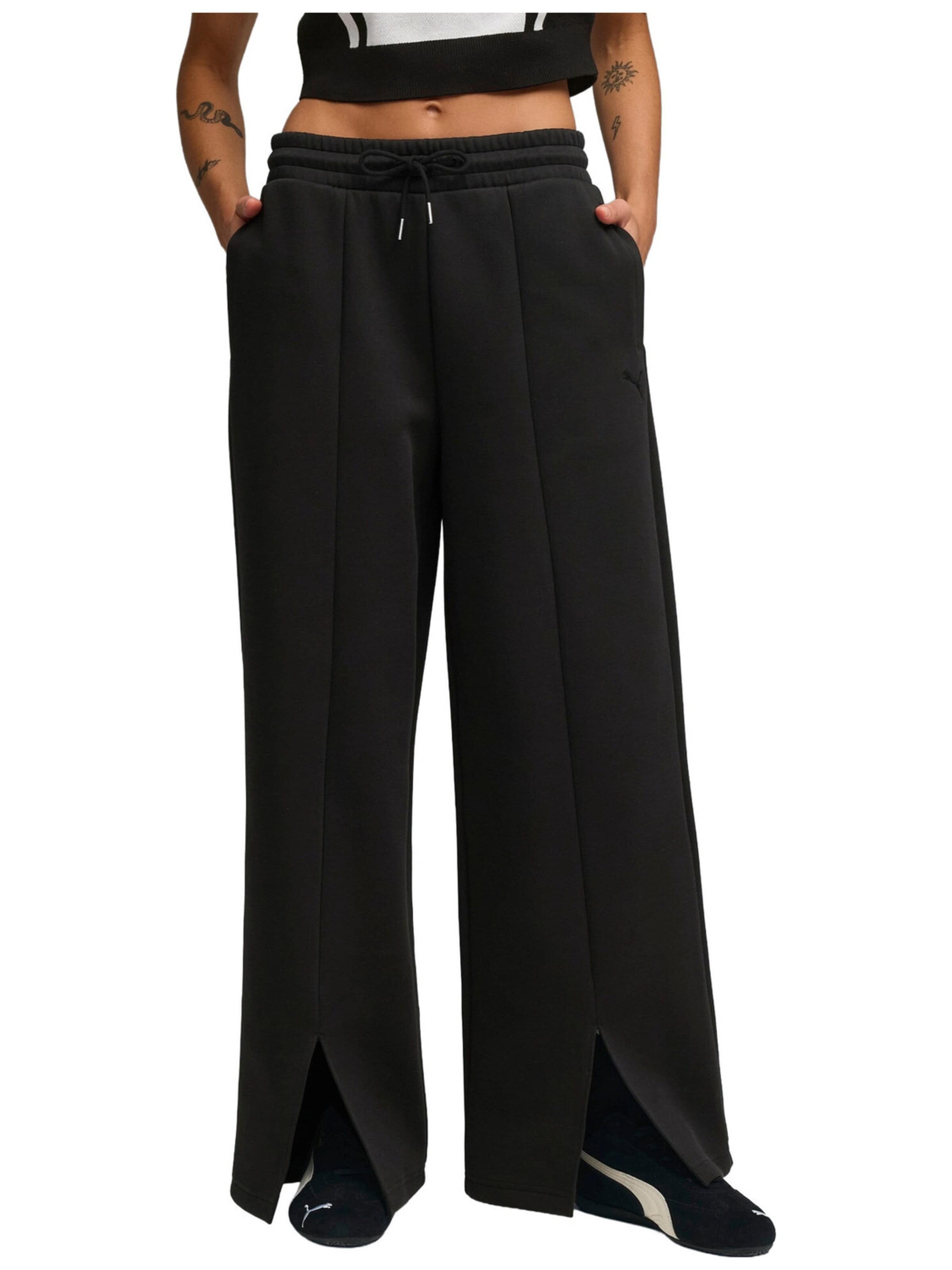 PUMA Regular Sports trousers 'Puma Wardrobe Ess Relaxed Pants Dk' in Black