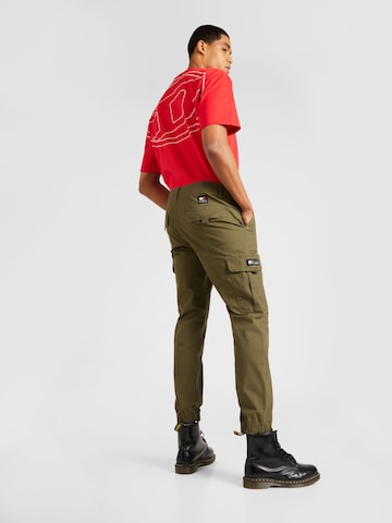 Tommy Jeans Tapered Cargobroek 'ETHAN' in Groen